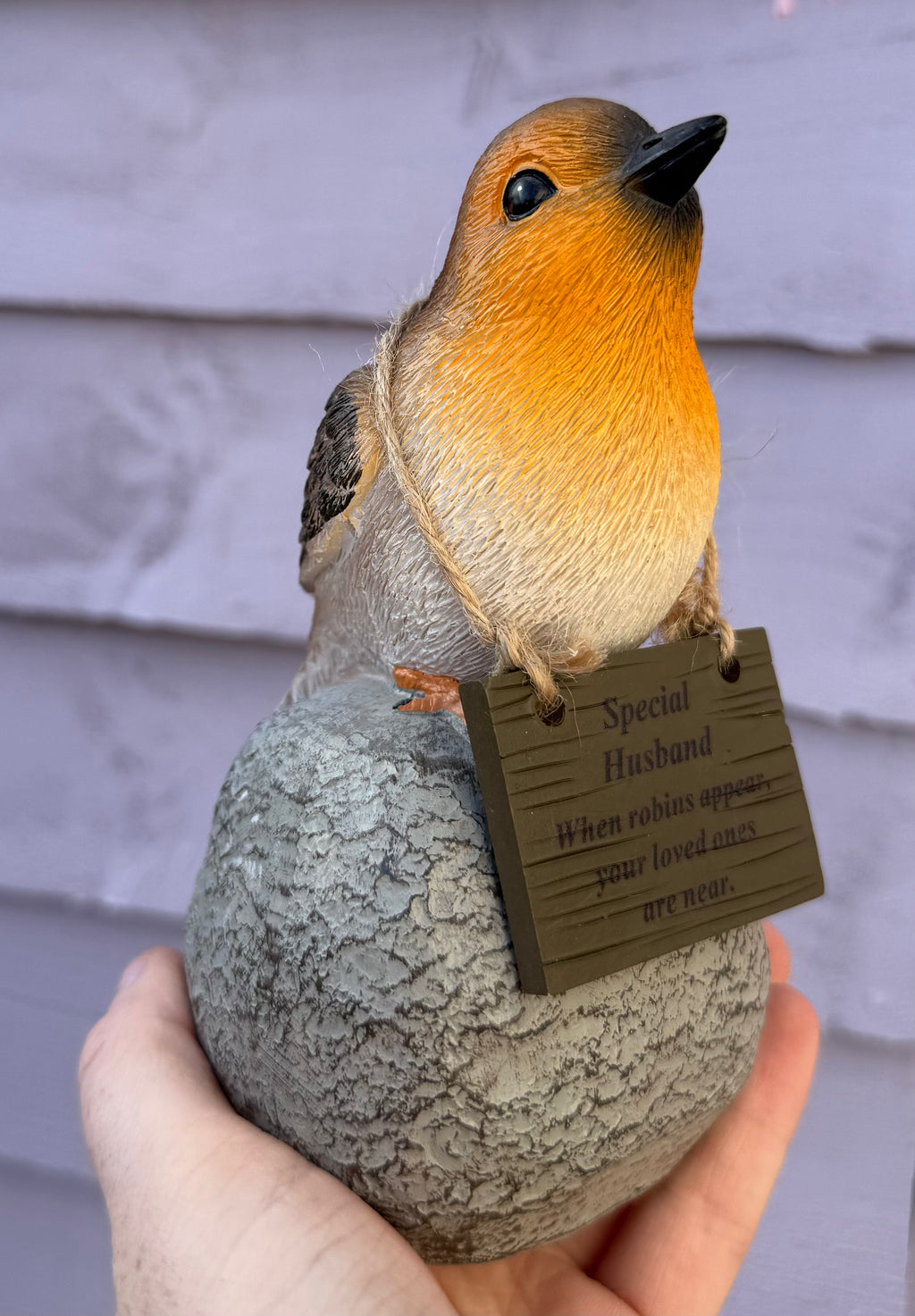 Robin on rock with hanging plaque - Husband